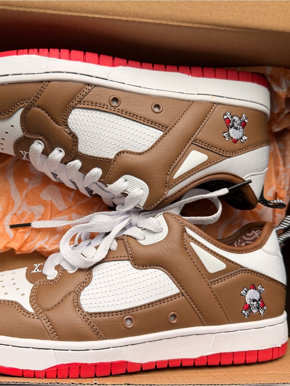 Brown and White Low-Top Sneakers with Red Sole
